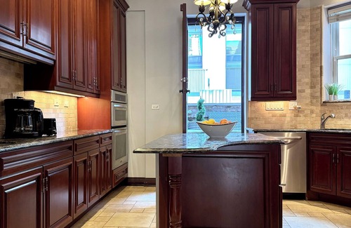 Gold Coast Maison | Gilded Age Gold Coast Mansion with Parking, Deck, Fireplaces