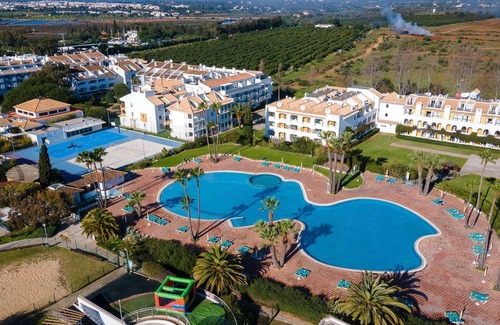 Cabanas Appartement | Golden 1 BDR Flat W/ Balcony & Pool by LovelyStay