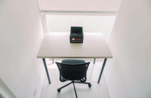 Pinang Appartement | Good and Homey Studio at Pacific Garden Alam Sutera Apartment By Travelio
