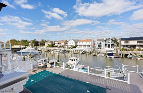 Riviera Maison | Magnifique propriété Bay Front avec glissement de bateau et piscine