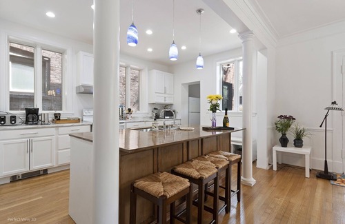 Hyde Park Maison | Gorgeous historic mansion on UChicago campus. Renovation with original detail.