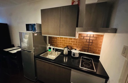 Downtown Hôtel | Gramercy Residences studio with Balcony facing city skyline