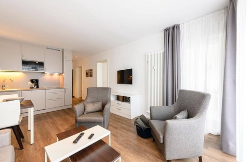 Bensersiel Appartement | Great 3-room vacation apartment in a quiet location with south-facing terrace near the beach - Deichhäuser Anna