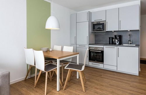 Bensersiel Appartement | Great North Sea apartment with balcony, parking, use of swimming pool & sauna - Deichhäuser Anna Küste
