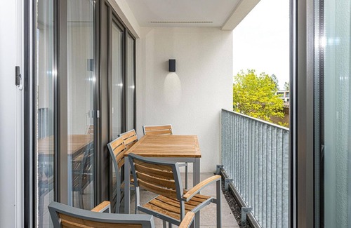 Bensersiel Appartement | Great North Sea apartment with balcony, parking, use of swimming pool & sauna - Deichhäuser Anna Küste