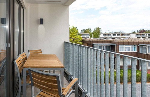 Bensersiel Appartement | Great North Sea apartment with balcony, parking, use of swimming pool & sauna - Deichhäuser Anna Küste