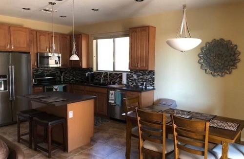 Palm Valley Maison | Grande maison de Palm Valley avec piscine chauffée privée / spa dans un quartier calme