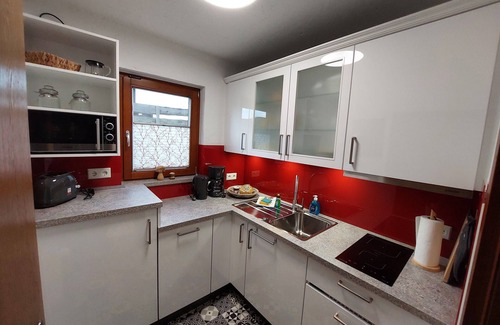 Barbis Appartement | Great vacation apartment with wood-burning stove for cozy evenings in the basement and sauna