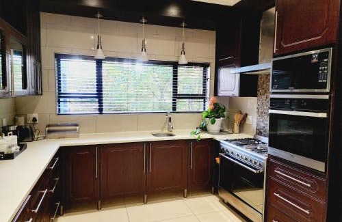 Olympus AH Maison | Green Forest Executive Suites