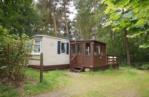 Weybourne Cottage | Green Shores - cette caravane est un lieu de vacances paisible situé dans le parc primé de Kelling Heath.