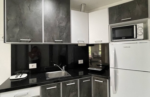Koura Appartement | Grey Escape Apartements