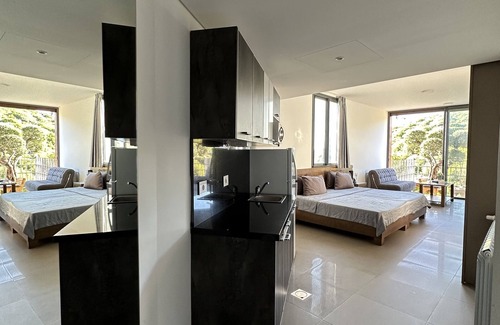 Koura Appartement | Grey Escape Apartements