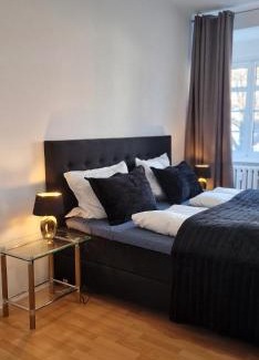 Daberstedt Appartement | Große Ferienwohnung Nähe Stadtpark, 4 Schlafzimmer, gemütliches Wohnzimmer, Terrasse, Parkplatz