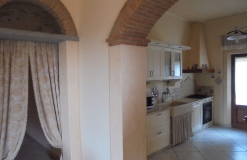 Chianni Maison | Appartement rez de chaussée avec loggia et jardin, vue panoramique