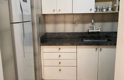 Vila Luis Antonio Appartement | Guarujá Apartment, Building on the Waves, Pitangueiras Beach, Pé na Areia