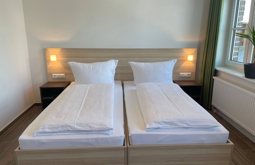Pasewalk Appartement | Guesthouse Besandung - Apartment 304 - Lokschuppen Pasewalk- Guesthouses with double room, single room and kitchen