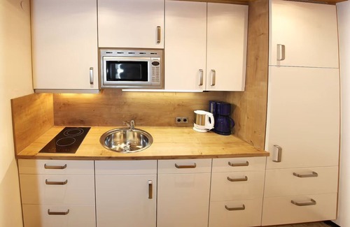 Kruen Appartement | Appartement "Edelweiß" avec vue sur les montagnes, jardin privé et Wi-Fi