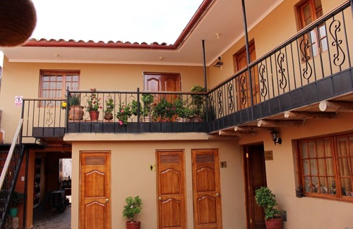 Chinchero Maison | Habitacion con una cama matrimonial