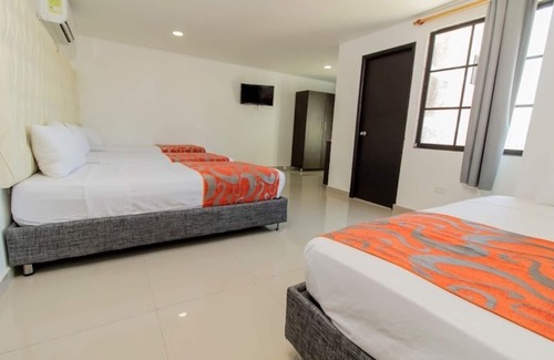 El Prado Hôtel | Habitacion Delux Cuadruple Cerca Al Malecón Turístico Río Magdalena Barranquilla
