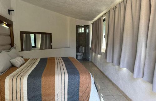 Valle de Bravo Cabine | Habitaciones las cascadas