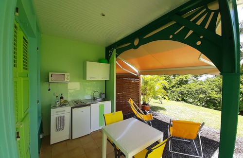 Saint-Pierre Appartement | Studio Le Tamaya, piscine & jacuzzi vue mer au calme.