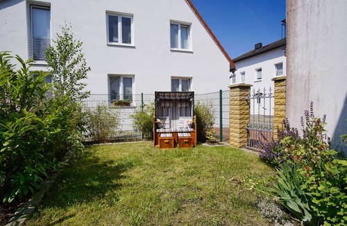 Wiek Appartement | hafennahe 1-Raum-Ferienwohnung mit kleinem Garten - Haus Windland FeWo 24