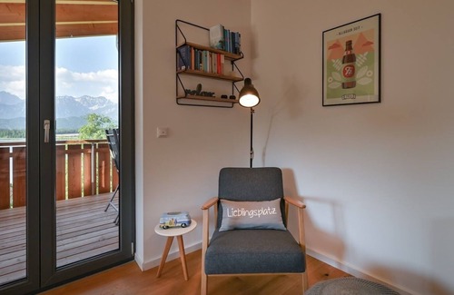 Hopfen am See Appartement | Happy Place - Modern penthouse with the best view of Lake Hopfensee & the mountains