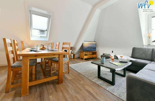 Wangerooge Appartement | Haus Dünenrose Ferienwohnung Strandläufer