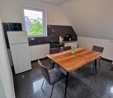 Haldem Appartement | Haus im Grünen - App OG