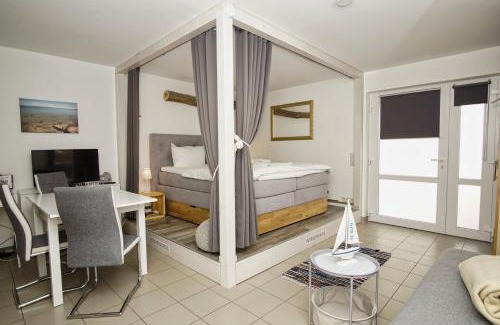 Wiek Appartement | Haus Windland FeWo 24 mit eingezäuntem Garten - ideal für den Hundeurlaub