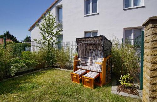 Wiek Appartement | Haus Windland FeWo 24 mit eingezäuntem Garten - ideal für den Hundeurlaub
