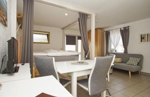 Wiek Appartement | Haus Windland FeWo 24 mit eingezäuntem Garten - ideal für den Hundeurlaub