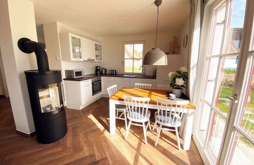 Stove Maison | Haus zwischen Mühle und Meer