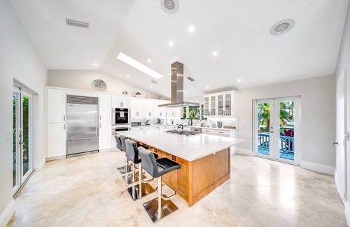 Tropic Isle Maison | Heated Pool & Waterfront! Close 2 Beach & Avenue!