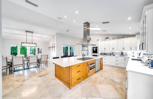 Tropic Isle Maison | Heated Pool & Waterfront! Close 2 Beach & Avenue!