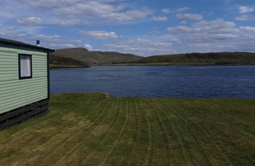 Slate Islands Maison | HEATHER, pet friendly, country holiday cottage, with a garden in Oban
