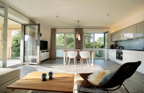Dangast Appartement | Cet appartement nordique moderne premium "Nordbudje" pour 4 personnes pulvérise e