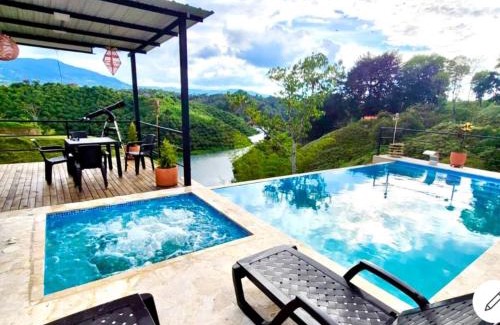 Guatape Maison | Hermosa habitación 203 deluxe GC