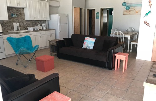 Spanish Wells Appartement | GEMME CACHÉE. Golf gratuit, embarquement vélo kayak 2 Min. à pied de la plage des ESPAGNOLS