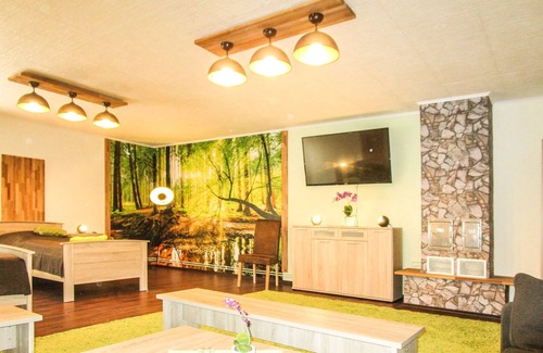 Mecklenburger Seenplatte Appartement | Appartement au sous-sol de haute qualité à Ihlenfeld, moderne et calme