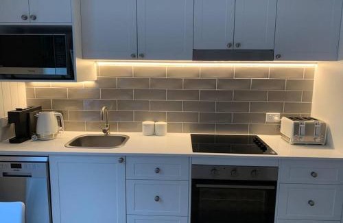 Corlette Appartement | HighTide- luxury apartment, almost on the beach.