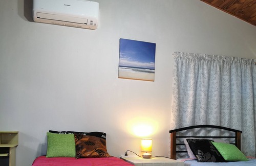 Titirangi Maison | Hilltop holiday home with stunning views.
