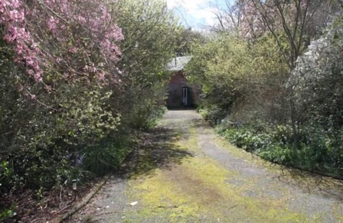 Otaki Cottage | Écuries en briques historiques
