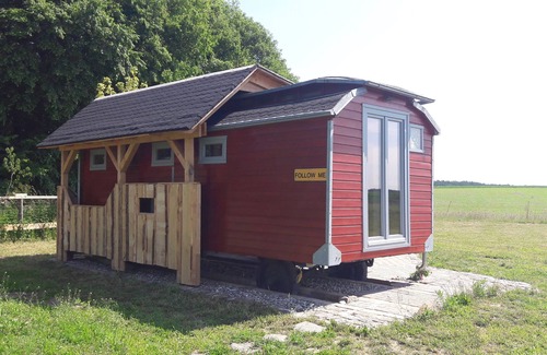 Ehmkendorf Cabine | Wagon de cirque historique dans un paysage idyllique et tranquille