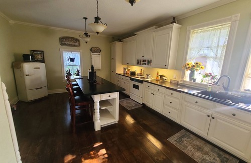 Waupaca Maison | Historic Queen Anne Victorian, full of character, charm, and mystery.