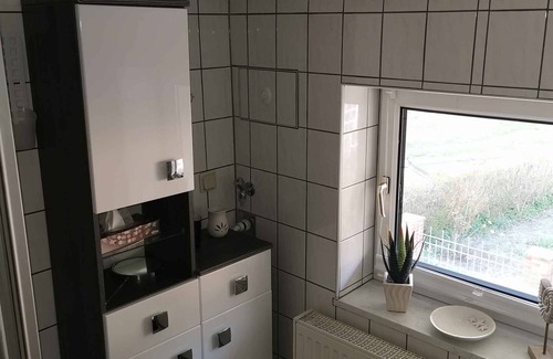 Lietzow Appartement | Appartement de vacances avec vue sur le petit Bodden de Jasmund et meubles de jardin