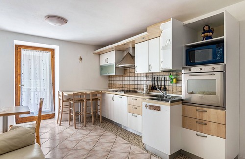 Baselga di Pine Appartement | Appartement de vacances 'Appartamento Lucia' avec balcon privé et Wi-Fi.