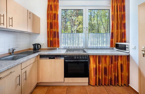 Region Hannover District Appartement | Appartement "Ferienwohnung 2" avec terrasse privée, jardin privé et Wi-Fi