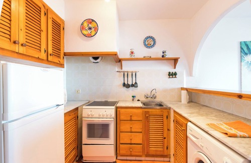 Arenal d'en Castell Appartement | Appartement de vacances "Apartamento en Arenal Castell" avec Wi-Fi, A/C, Piscine, Terrasse et Jardin