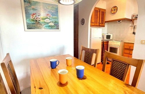 Arenal d'en Castell Appartement | Appartement de vacances "Apartamento en Arenal Castell" avec Wi-Fi, A/C, Piscine, Terrasse et Jardin